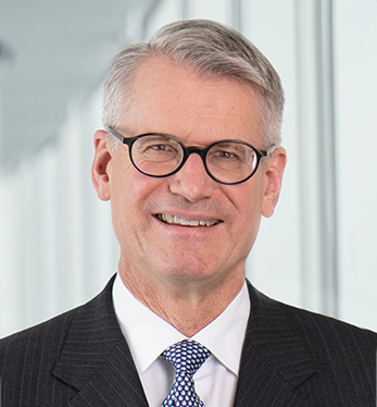 Mark Garrett — Chairman of the Supervisory Board (portrait)